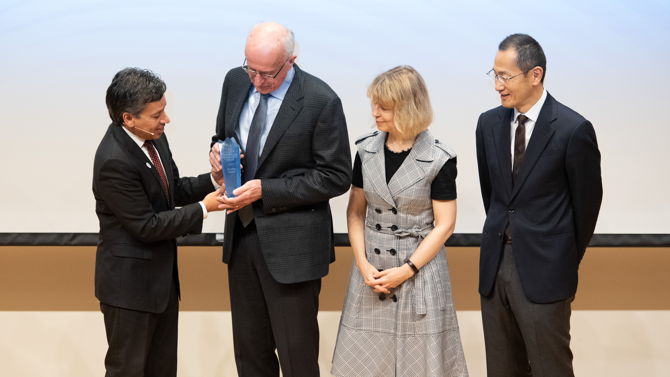Deepak Srivastava, Deborah Sweet, and Shinya Yamanaka present the 2019 Ogawa-Yamanaka Stem Cell Prize to Gordon Keller. 