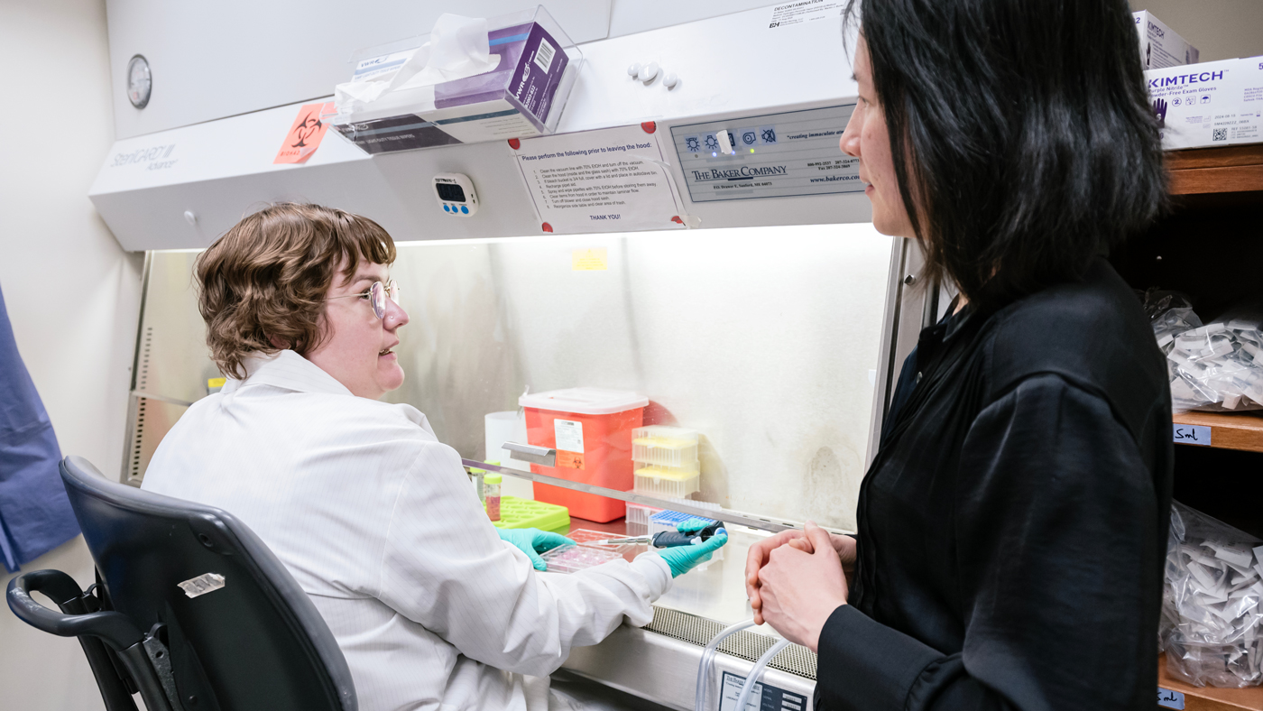 Ashley George and Nadia Roan in a tissue culture room at Gladstone Institutes