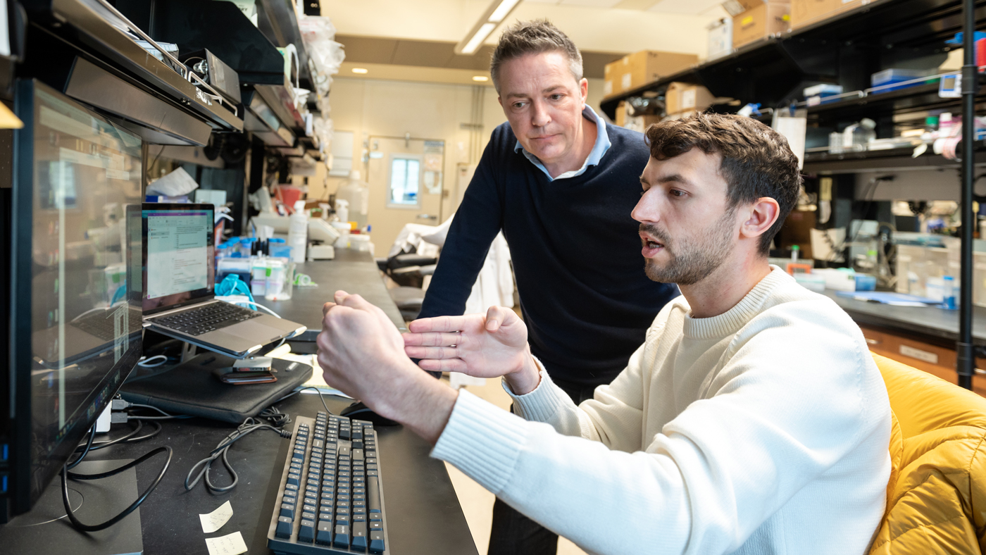 Scientists Benoit Bruneau and Jon Muncie in the lab at Gladstone Institutes