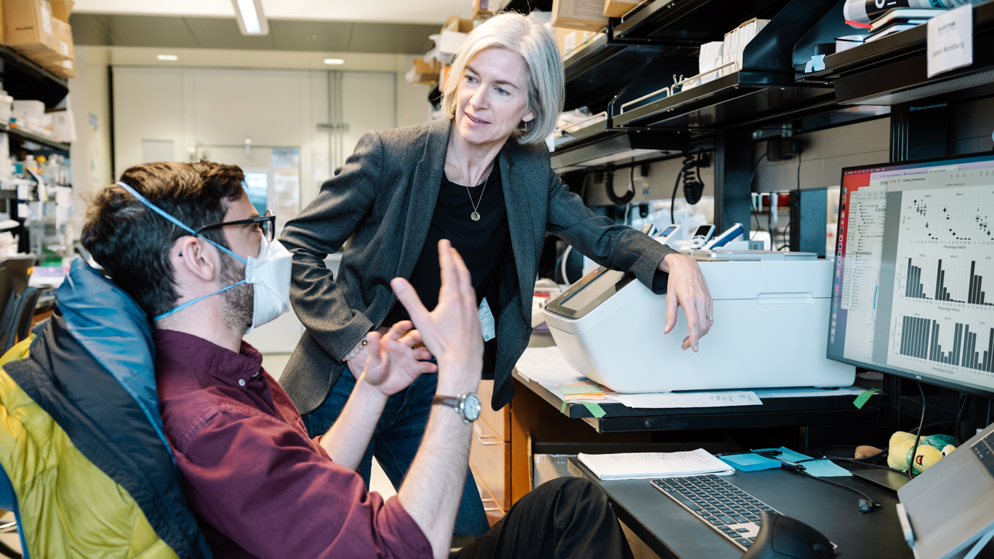 Jennifer Doudna working with a postdoc in the lab at Gladstone Institutes