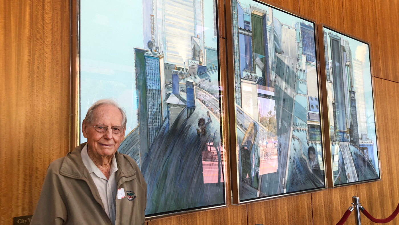 Wayne Thiebaud in front of his painting at Gladstone Institutes