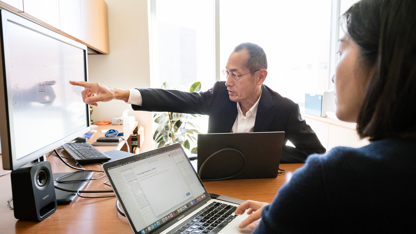 Shinya Yamanaka and Haruko Kunitomi in his office at Gladstone Institutes